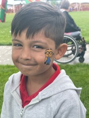 kid with temporary tattoo